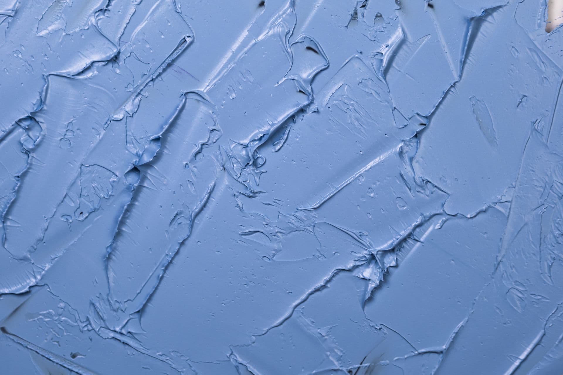 Blue architectural paint formulated with acrylic binder
